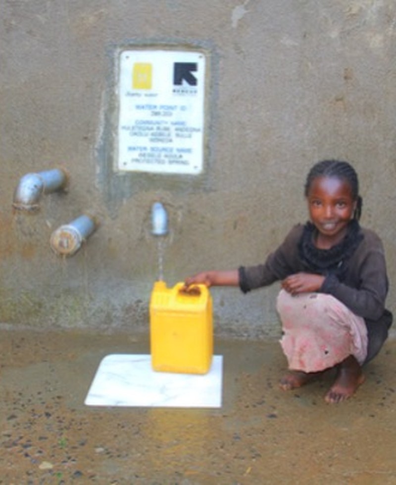 Girl getting clean water